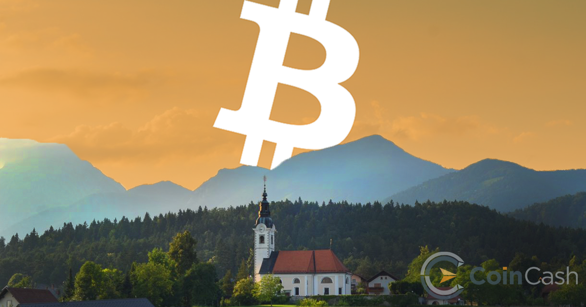 Szlovéniai táj, a háttérben bitcoin logóval. 